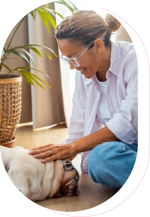Pet sitter caring for dog